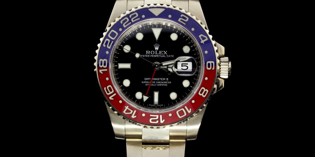 Rolex GMT Master II in 14k White Gold.