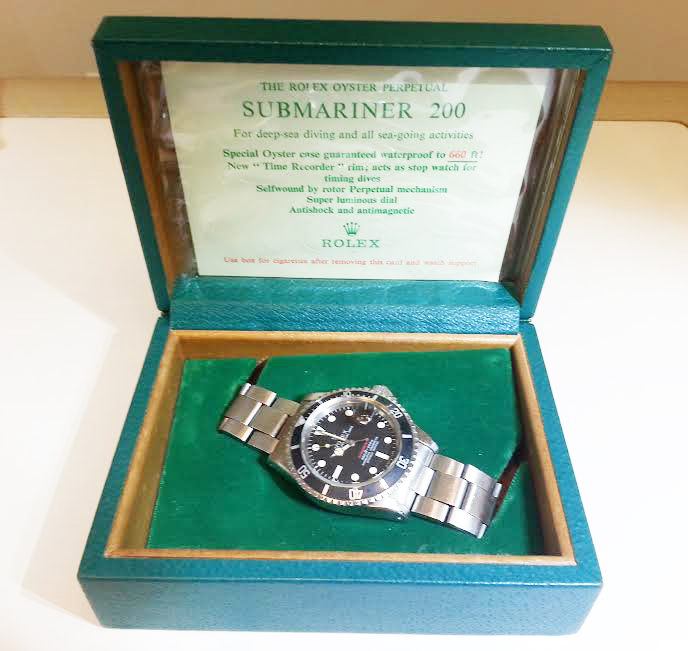 This Red Submariner is in excellent condition and has almost all of the authentication documentation.