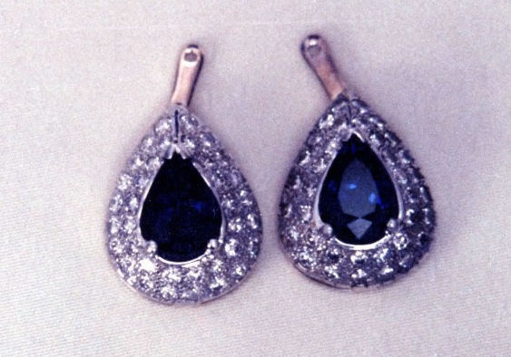 A pair of pave settings. For this piece, jewelry buyers would only consider the center stone.